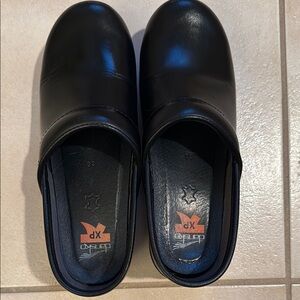 Dansko Black Leather Women's Clogs